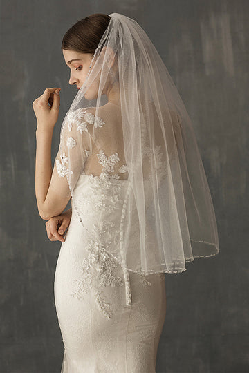 Voile de mariée blanc perlé mi-long fait à la main
